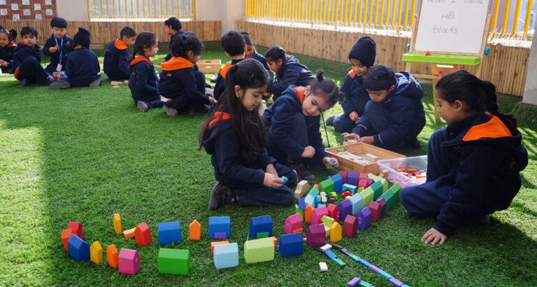 At Prometheus School, students engage in collaborative efforts, harnessing their creativity to construct innovative structures using blocks