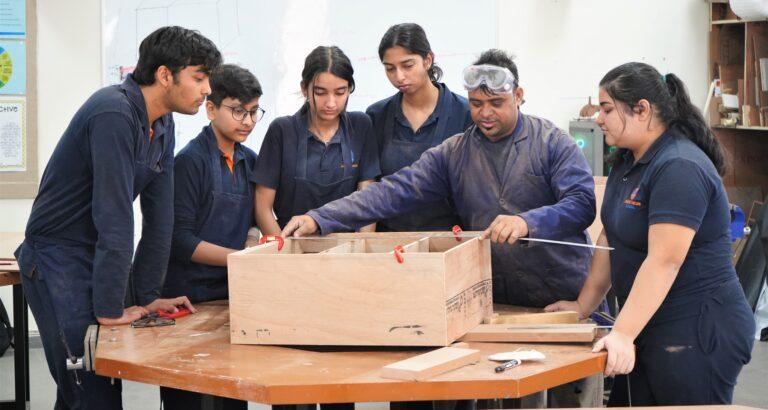 Prometheus School's secondary school students are actively involved in executing a product within the design thinking lab.