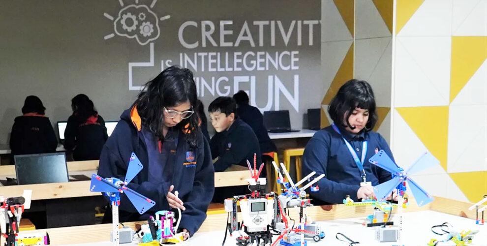 Prometheus School students are using block programming to build robotics projects in the Lego Robotics Lab