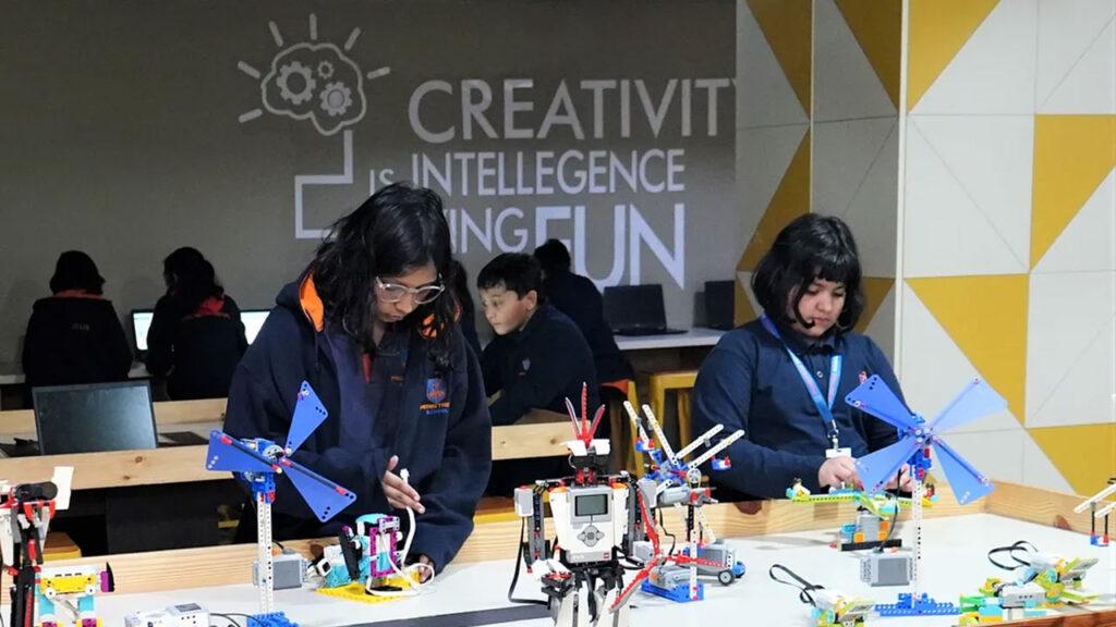 Prometheus School students are using block programming to build robotics projects in the Lego Robotics Lab