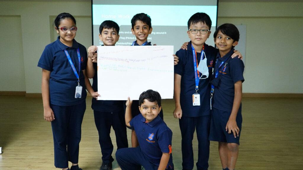 The students of Prometheus School collaborated in groups to create presentations for the MUN, demonstrating their collective efforts and teamwork