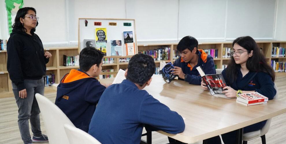 Prometheus school students engaged in reading and writing program in the secondary school library