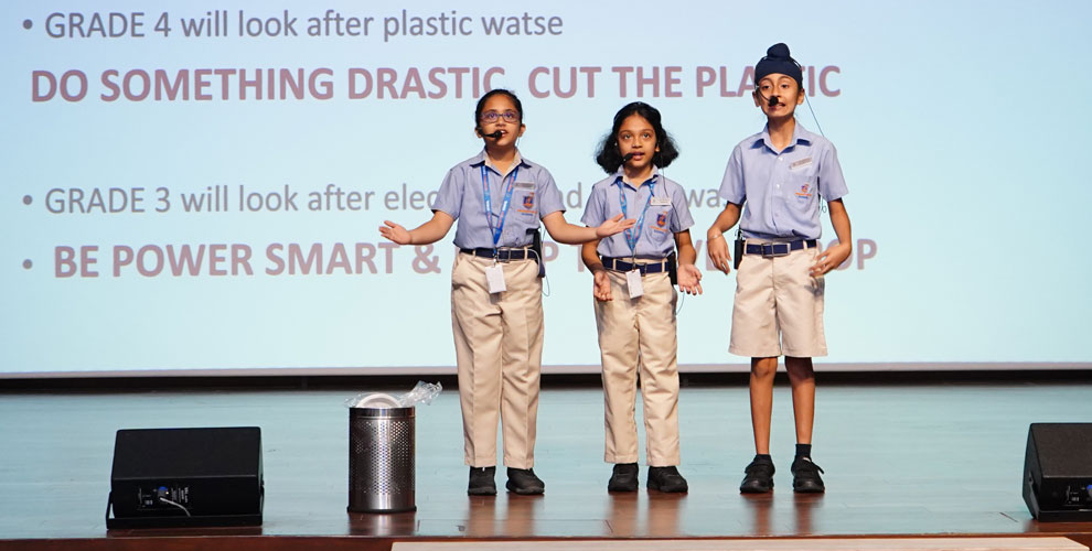 students are giving a presentation on Sustainable Development and the initiatives taken at Prometheus School, showcasing their understanding and engagement with global sustainability goals