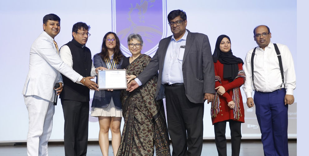 Samaera Rana, the newly inducted President of the Interact Club, being presented with her certificate by Chairperson Mr. Mukesh Sharma, Director Mr. Abraham, Principal Ms. Joshi, and Chief Guest Mr. Kushagra