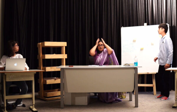 Prometheus School students practicing a theatrical performance with expressive gestures and engaging body language