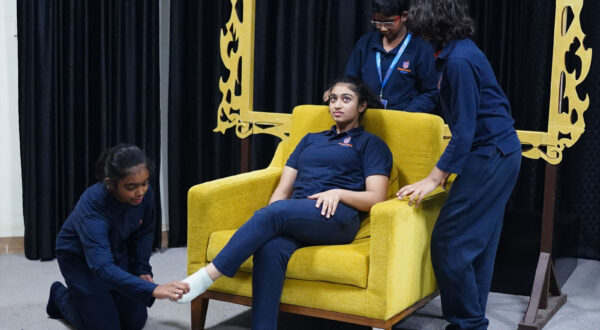 Prometheus School students presenting a lively skit in the drama room, demonstrating teamwork and acting talent