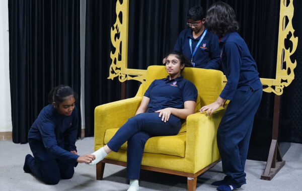 Prometheus School students presenting a lively skit in the drama room, demonstrating teamwork and acting talent