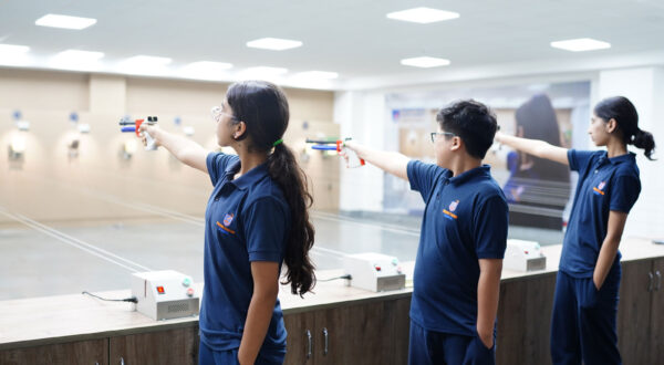 Student training session: Prometheus School students focus on mastering pistol shooting techniques in the school’s shooting range