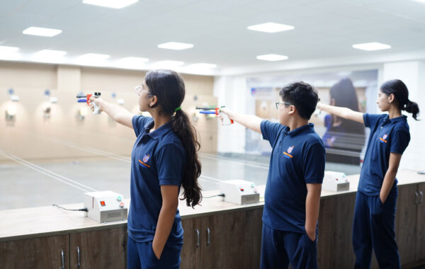 Student training session: Prometheus School students focus on mastering pistol shooting techniques in the school’s shooting range